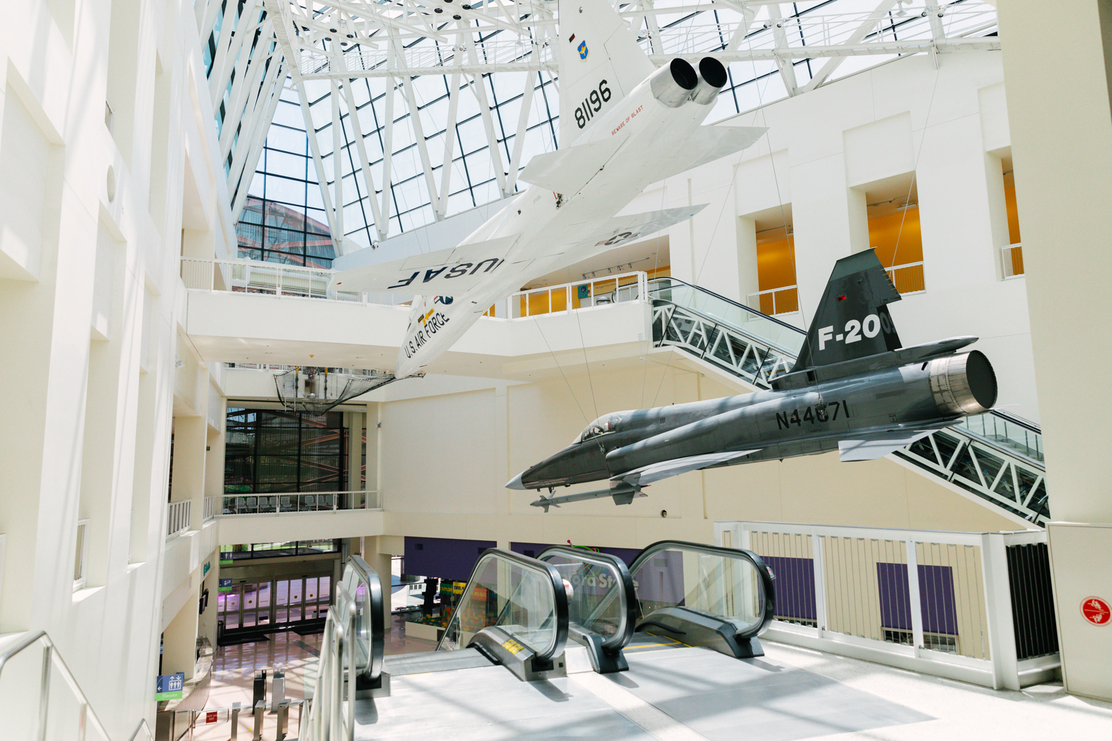 View of the F-20 Tigershark and Northrop T-38 Talon aircrafts from 2nd floor Disney Science Court