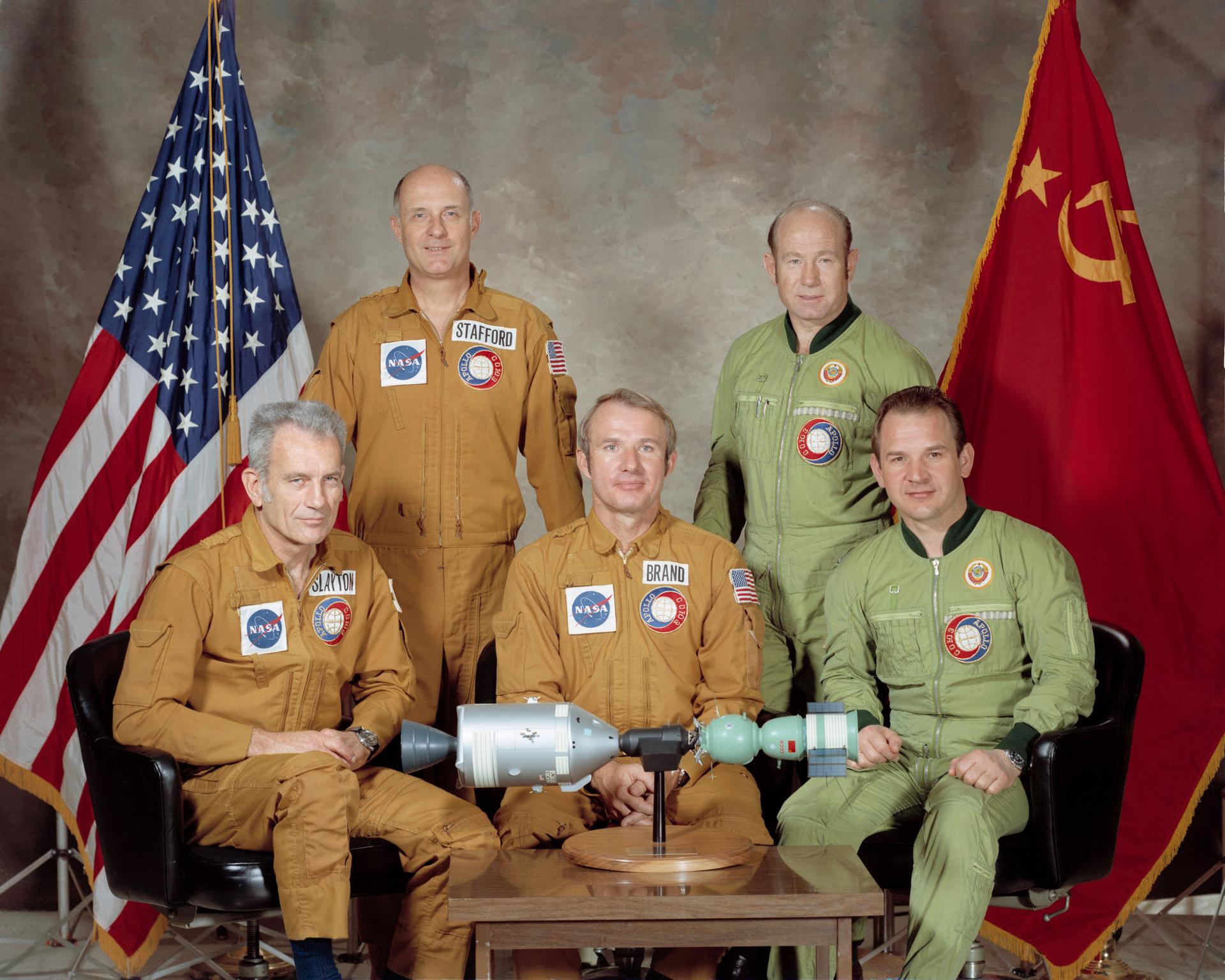 portrait of five men (3 American, 2 Soviet) who make up the two prime crews of the 1975 Apollo-Soyuz mission