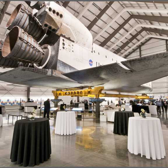 Black and white cocktail reception from the tail end of the Space Shuttle Endeavour
