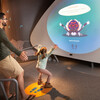 Guests play with a mating dance interactive in the Life! Beginnings exhibition