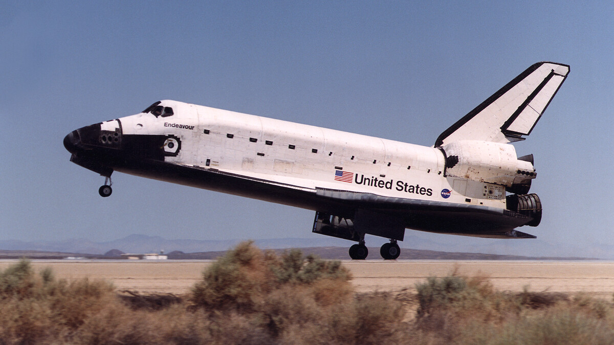 Space shuttle Endeavour lands in the California desert at Edwards Air Force Base