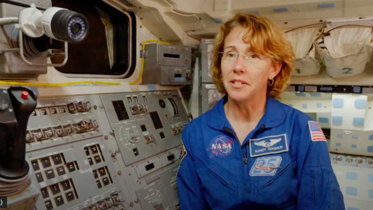 Astronaut Sandra Magnus inside space shuttle Endeavour.