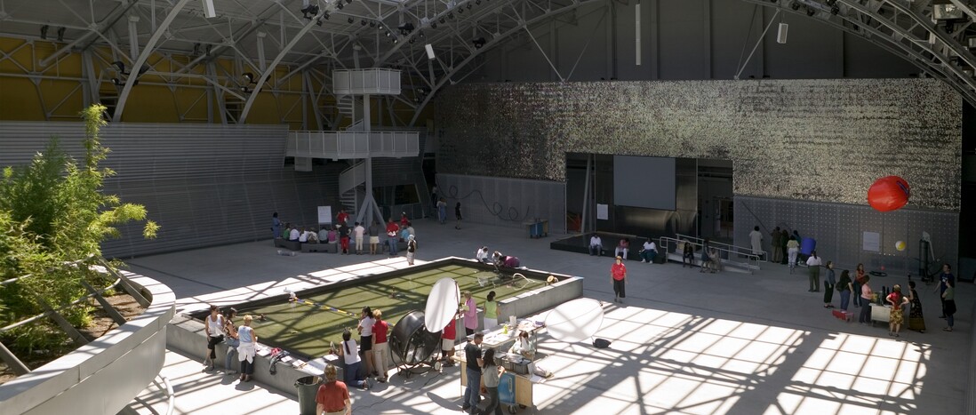 Big Lab with people participating in a variety of science activities